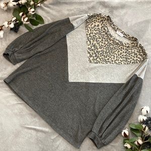 First Love brand long sleeve top. Womens size M. Loose fitting.